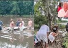 বানভাসি অসমে দাহের জন্য শুকনো জমি মিলল না! ১০৬ বছরের বৃদ্ধার শেষকৃত্য হল পুকুরপাড়ে এক চিলতে মাটিতে